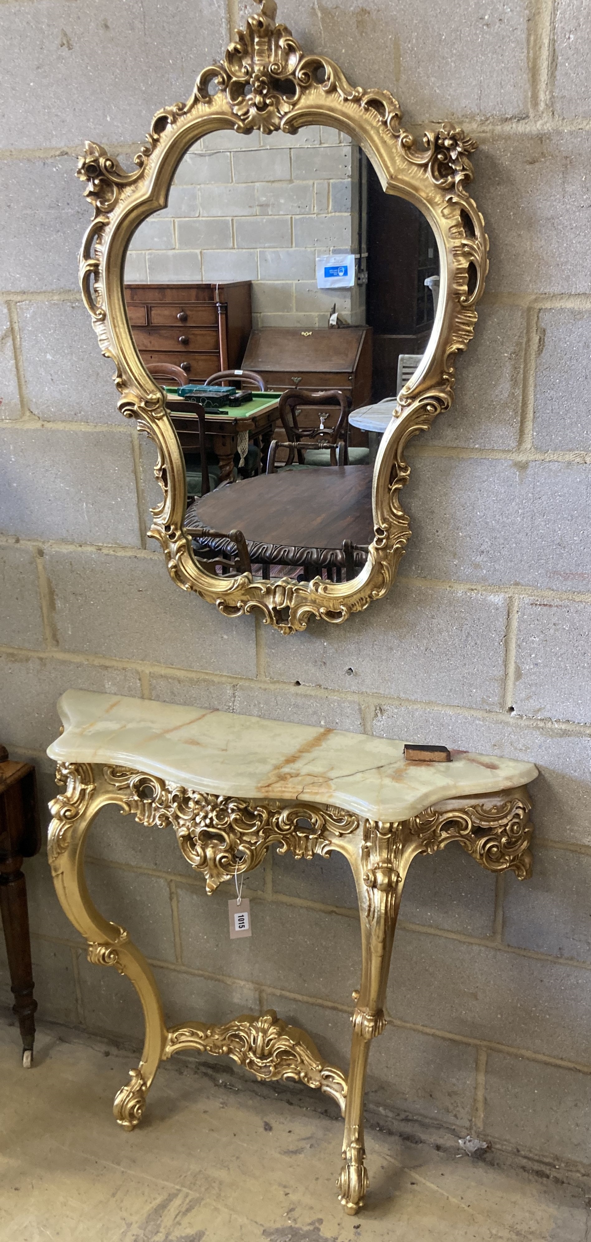 An 18th century style onyx topped gilt console table, width 94cm, depth 29cm, height 87cm with mirror